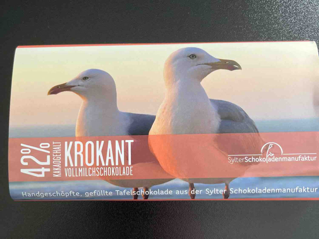 Café Wien Vollmilchshokolade mit Krokant, 42% Kakaoanteil von ha | Hochgeladen von: hanneshussmann Café Wien Vollmilchshokolade mit Krokant, 42% Kakaoanteil von ha | Hochgeladen von: hanneshussmann