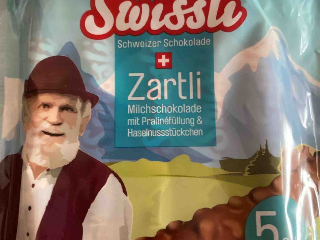 Swissli Zartli, Milchschokolade mit Pralinefüllung & Haselnu | Hochgeladen von: schokoqueen