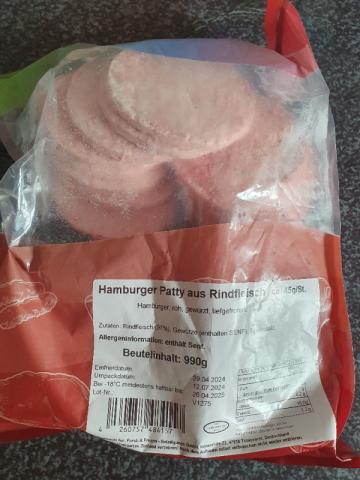 Hamburger Patty aus Rindfleisch, roh, gewürzt, riefgefroren von  | Hochgeladen von: phinxx